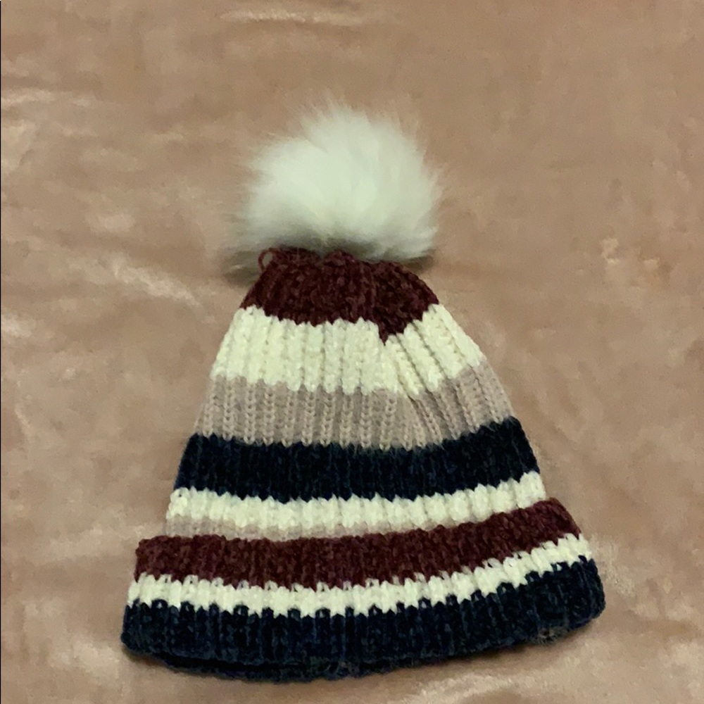 A cute winter hat with a puff ball!